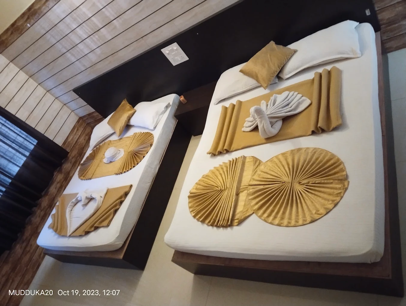 Comfortable hotel room interior in Kollur